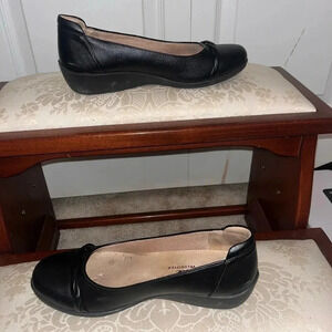 Life stride slip on flats black in color rope like on top